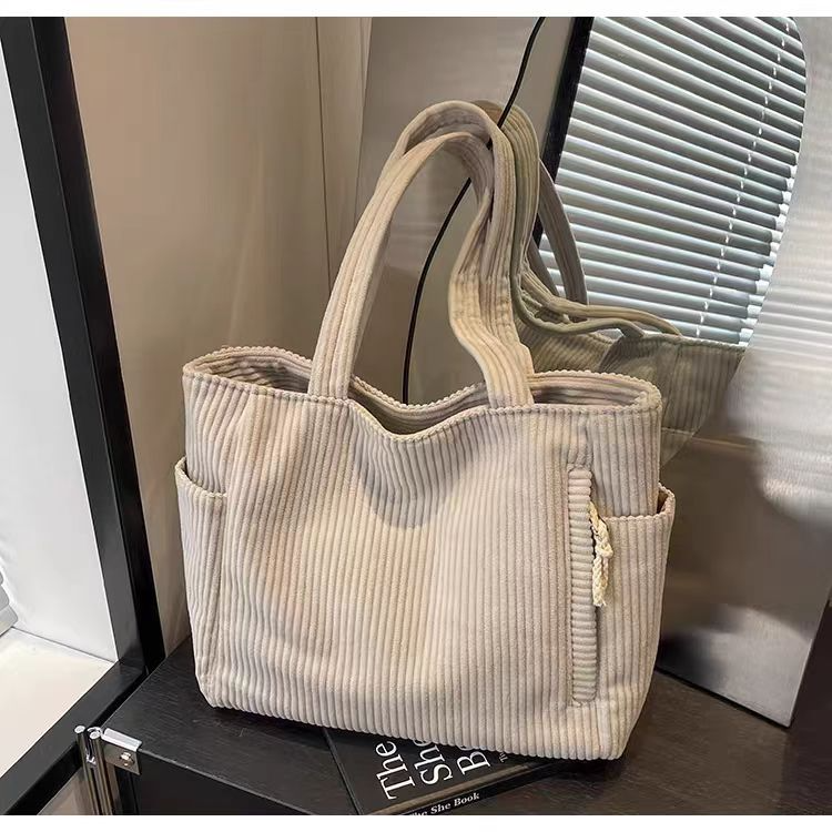 Women's beige corduroy tote bag with pockets