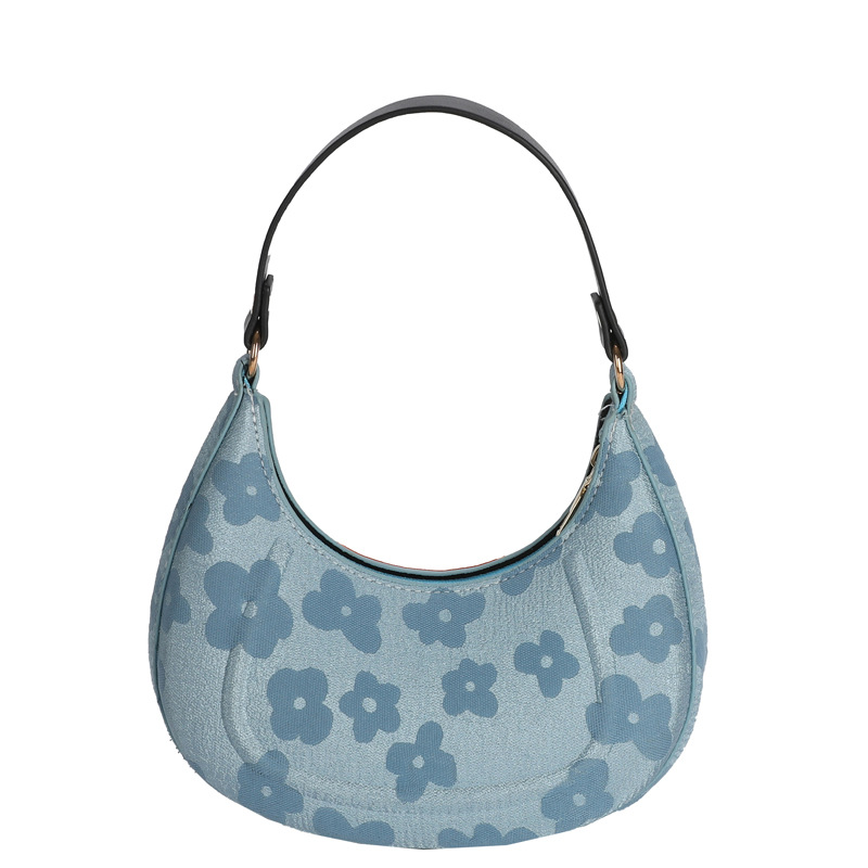 Blue floral jacquard crescent shoulder bag with black strap